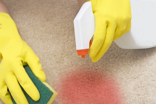 Professional oven cleaning in Queenspark removing grease from an oven interior