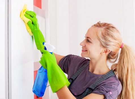 Professional cleaner in Queenspark preparing a tidy living space