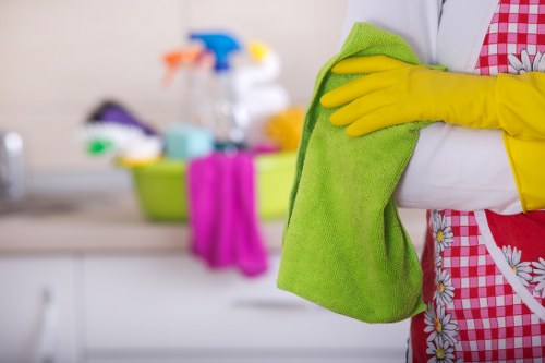 Professional carpet cleaning team preparing equipment at a property